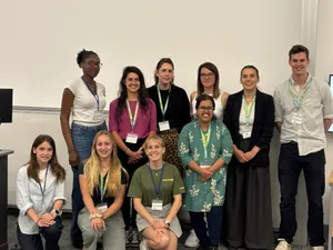 A group of people smiling