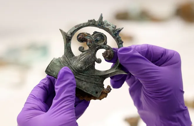 A decorative copper alloy finial from the Melsonby Hoard.