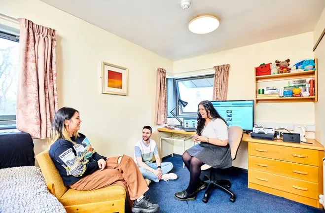 Students talking in a room