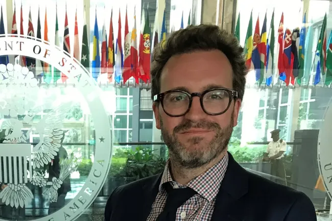 Man with glass and beard