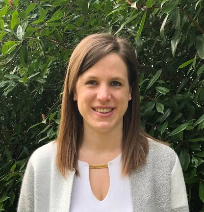 A woman smiling for the camera