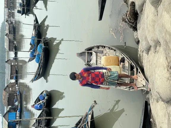 Man on boat in river