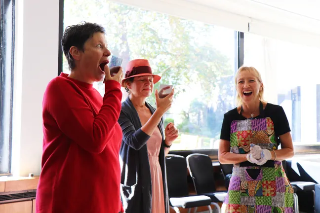 Individuals at a breathing workshop