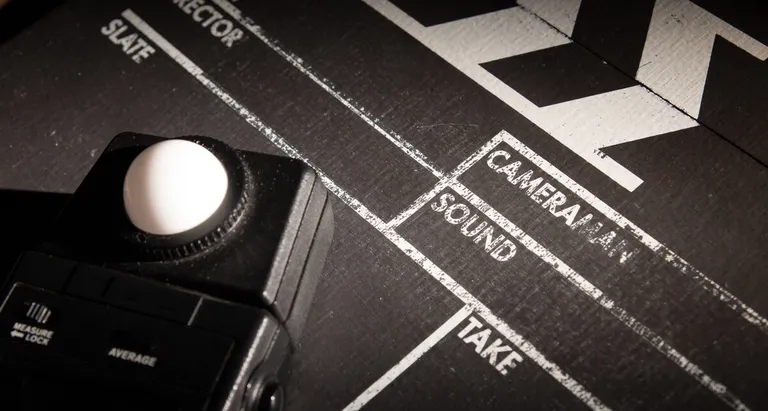A light meter and clapperboard