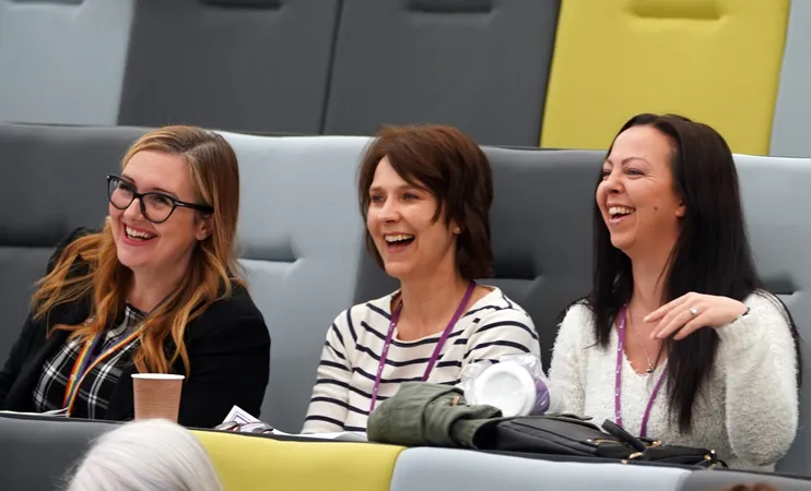 People sat in lecture theatre