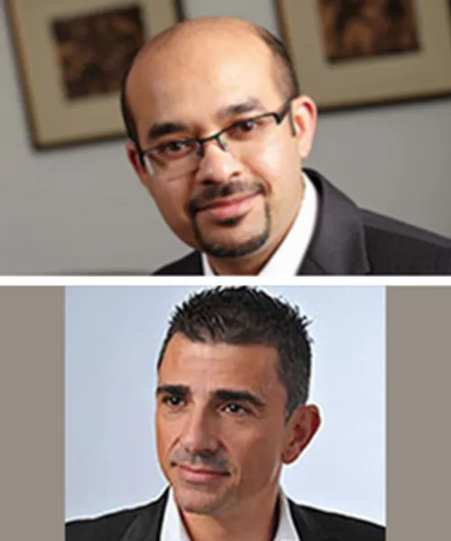 Professor Dennis Philip and Professor Panayiotis Andreou