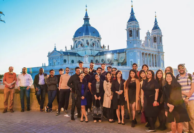 Group of people stood outside a church