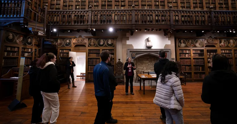 Image of a group having a tour in Bishop Cosin's Library
