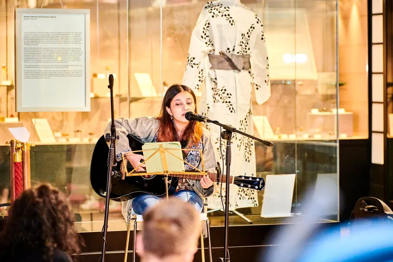 Guitarist singing in the Oriental Museum
