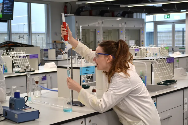 A student performs a science experiment
