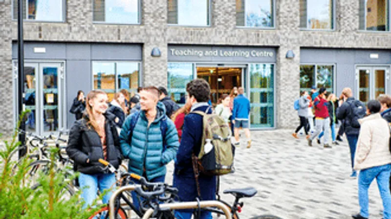 A group of students outside the teaching and learning centre