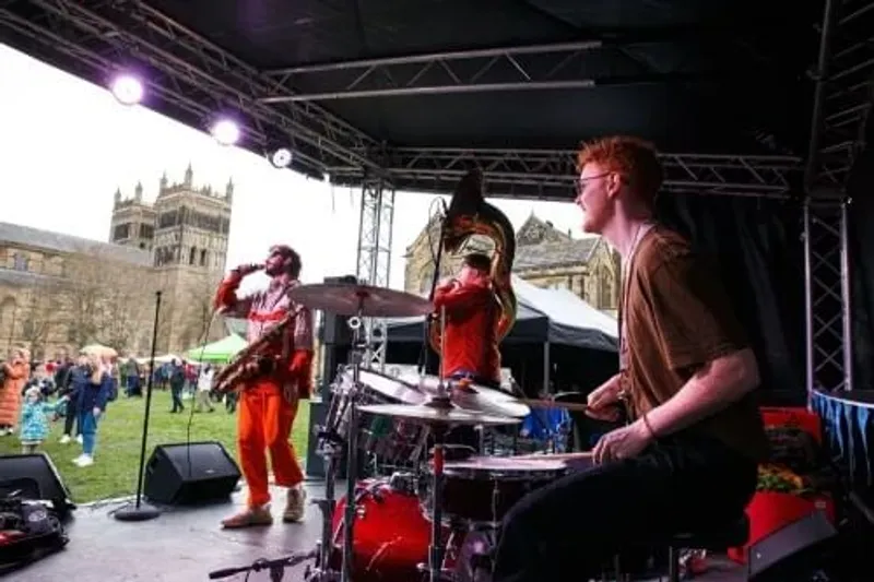 students performing live music outside the cathedral.