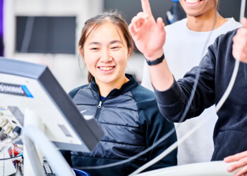 Female student laughing