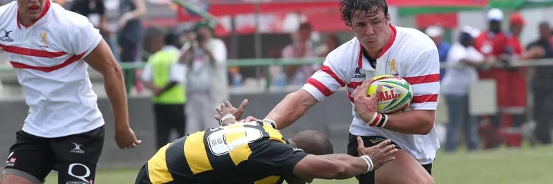 Male rugby players in a game.