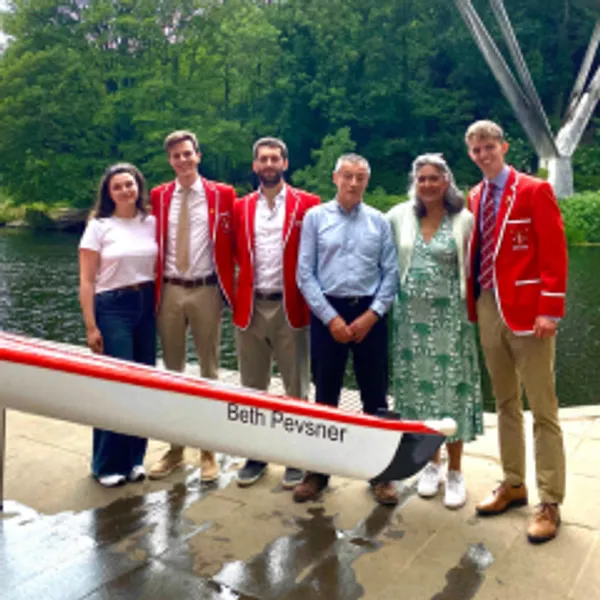 5 people with Sonia Virdee behind boat