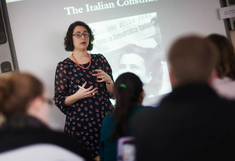 Lecturer doing a presentation to an audience