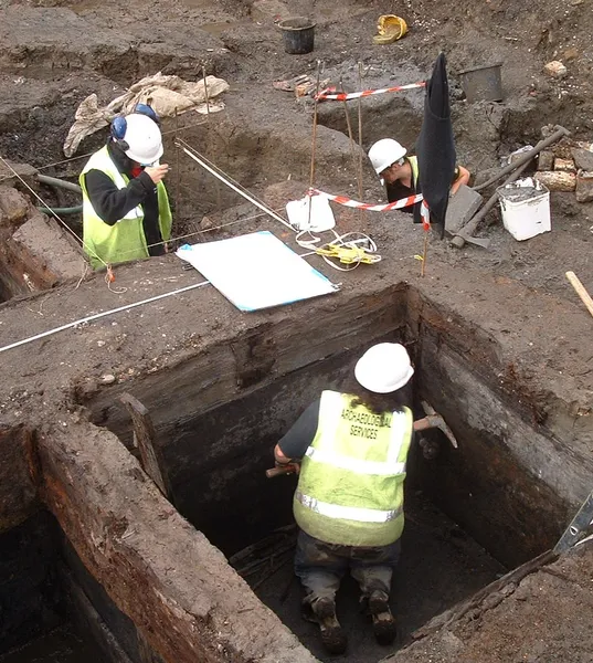 Students inside an excavation during an archaeology field trip
