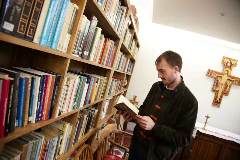 Person browsing books in library