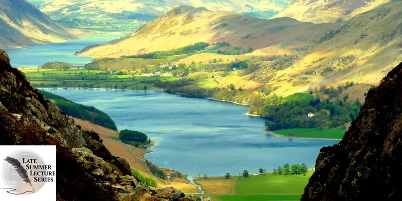 Dramatic landscape view of a lake and rolling hills