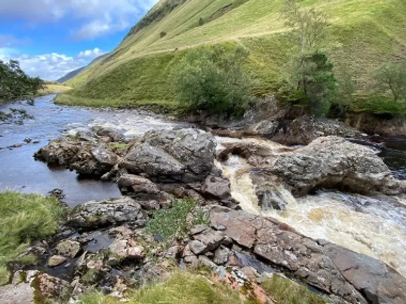 Example of a Scottish post-glacial river (River Tilt) where bed sediment cover is spatially variable around bedrock features such as waterfalls..