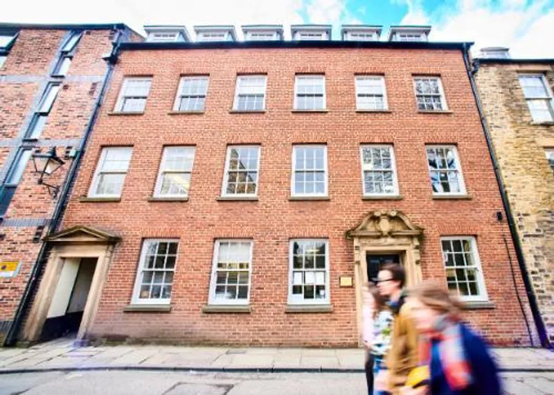 Outside view of brick building which houses History Department