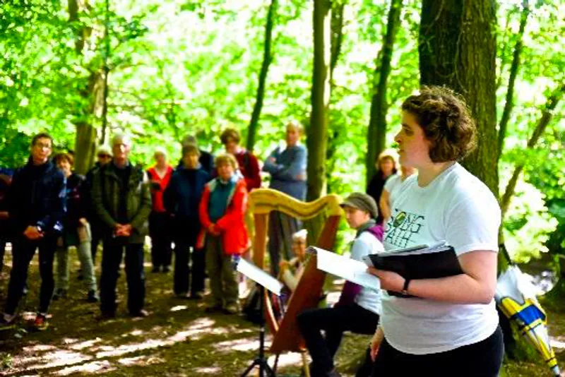 Musicians performing in a forest