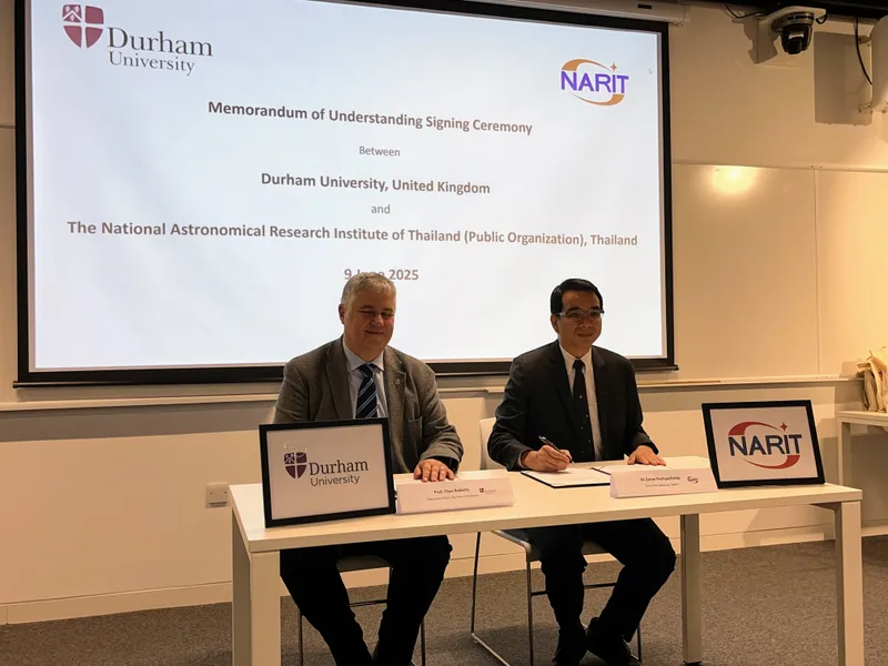 Photo of people signing MoU