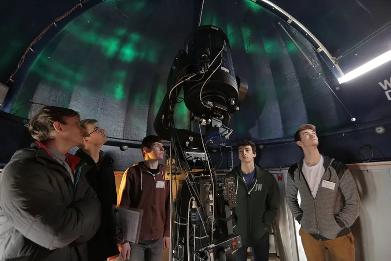 People with telescope