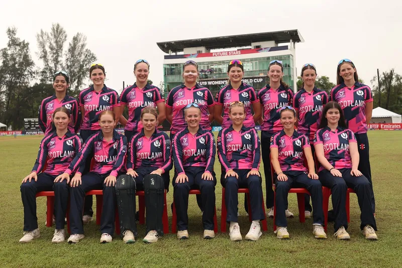 Student Rosie Speedy posing in a Team photo at the Cricket World Cup