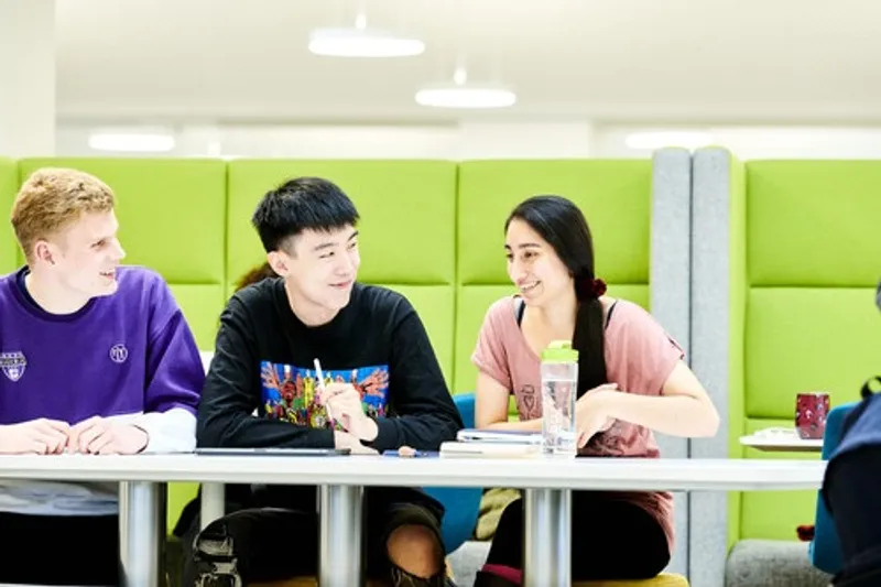 three Students working together