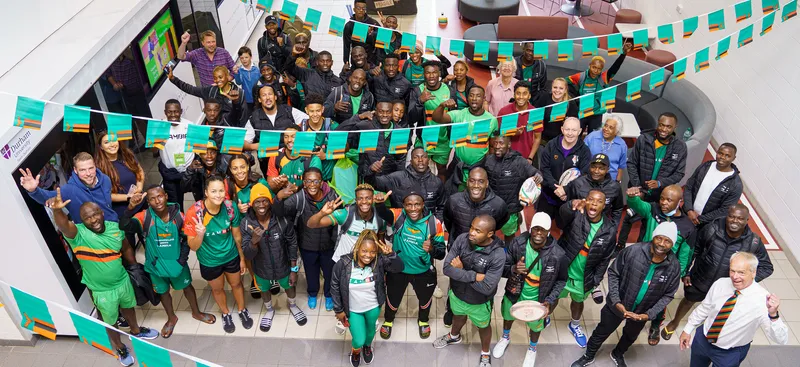 A group of athletes smiling at camera