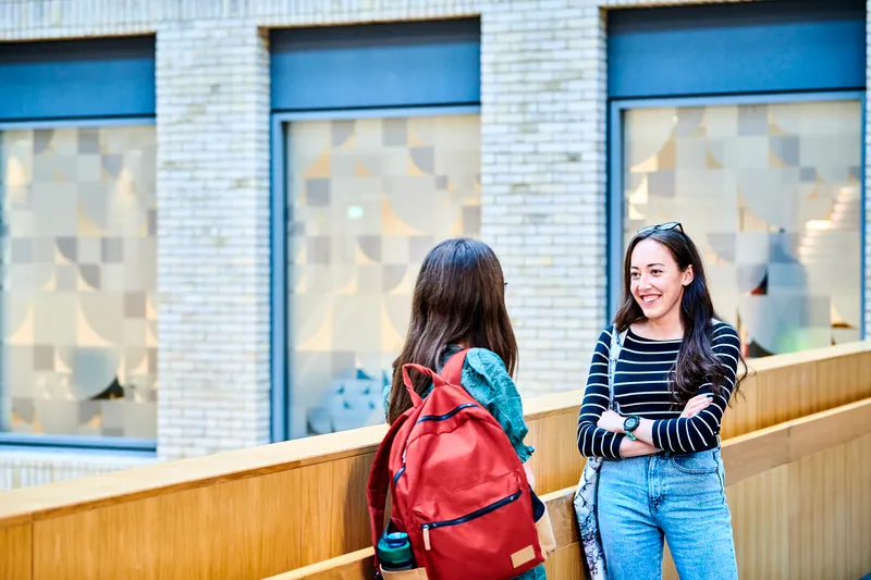 Two students having a conversation