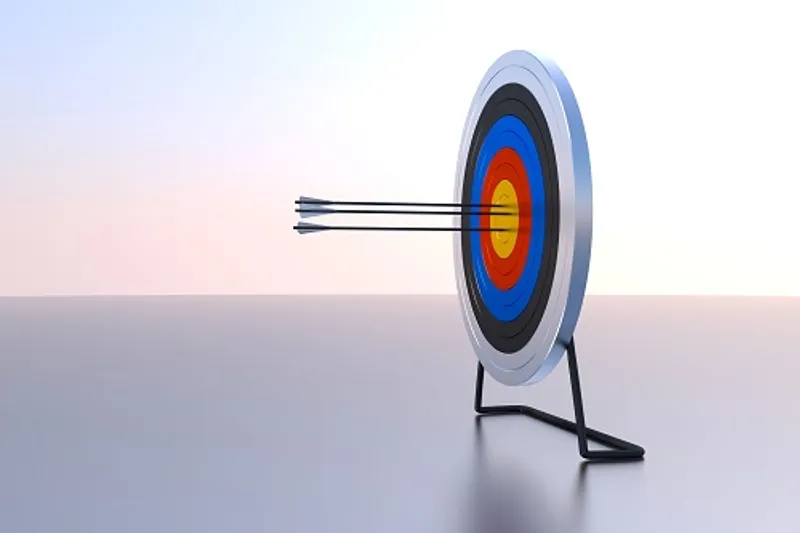 Archery board with arrow at its centre