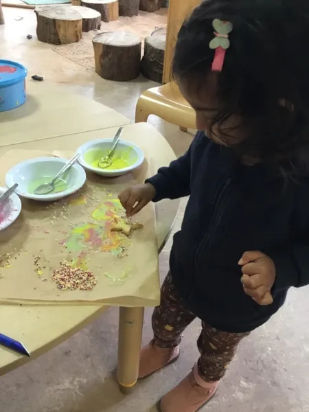 Child playing with wooden blocks