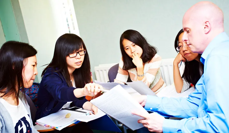 People in a seminar in discussion