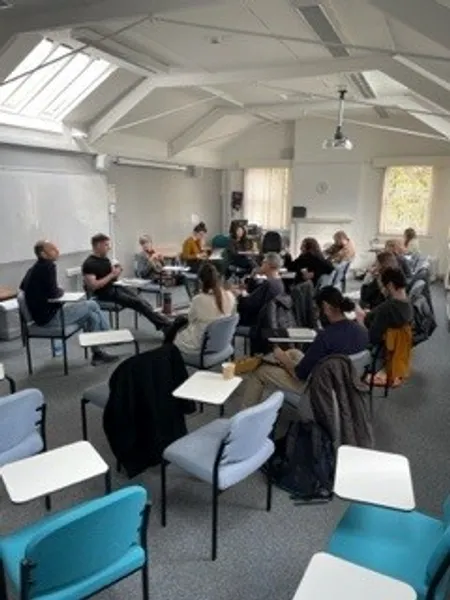 Academics attending a roundtable with Helen Longino