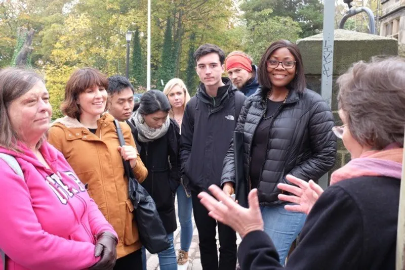 People listening to speaker on DEI Coal Day Tour