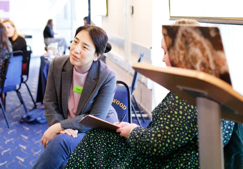 Researchers engaged in lively discussion