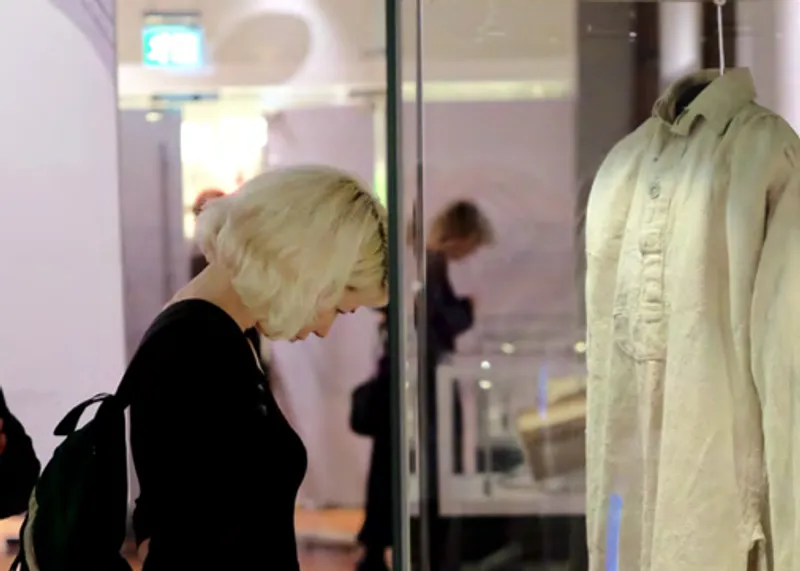 A person looking at a strong dress