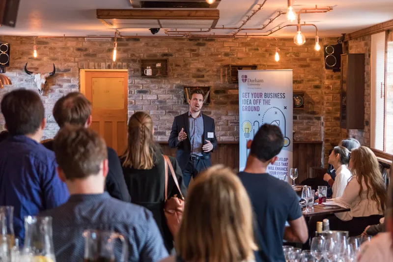 A man presenting to an audience