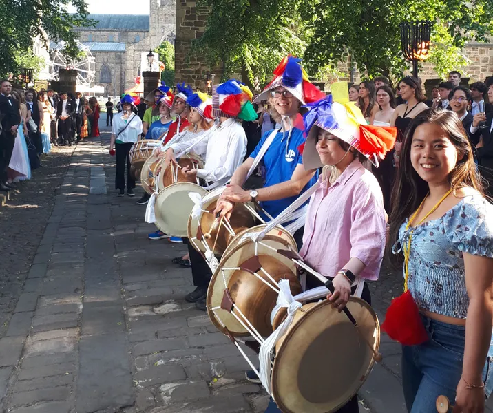 Pungmul players stand in a line