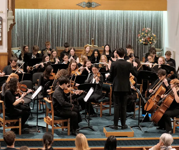 Orchestral players performing in Elvet Methodist Church