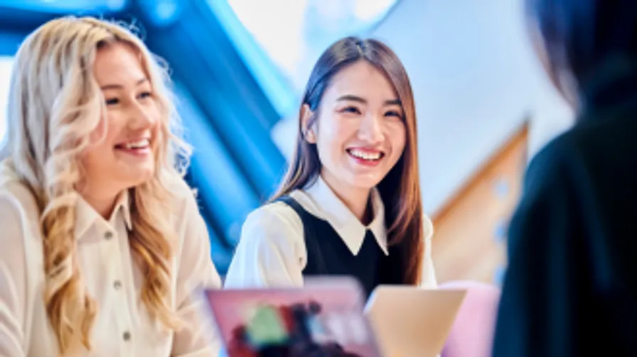 Two female students studying
