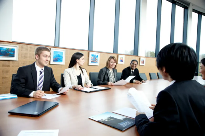 MBA 2013 Students in board room