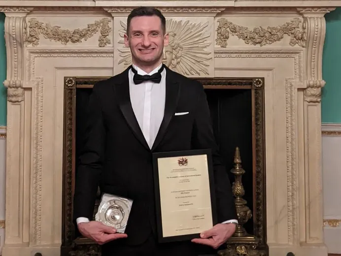 Photograph of MSc Finance graduate Avery Aylesworth with Lombard Prize