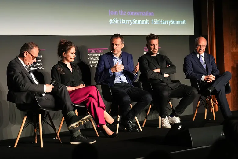 Panel of journalists onstage at the Sir Harry Evans Summit