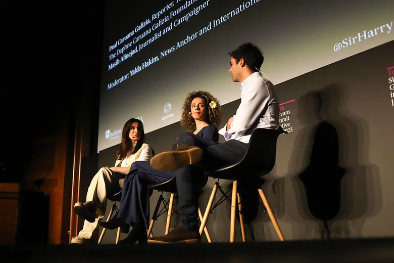 Panel of journalists onstage at the Sir Harry Evans Summit