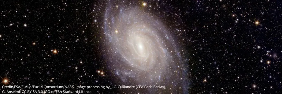 A spiral galaxy against a starry space backdrop