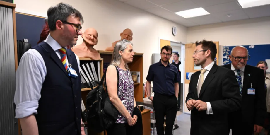 Consultant Anaesthetist Dr Derek Randles discusses simulation training with Chancellor Dr Fiona Hill