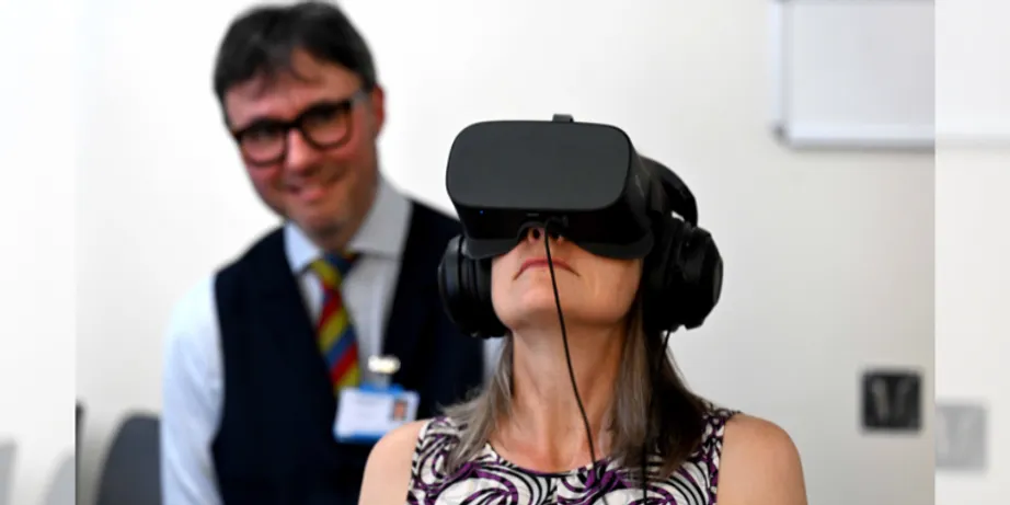 Chancellor Dr Fiona Hill wearing a virtual reality (VR) headset